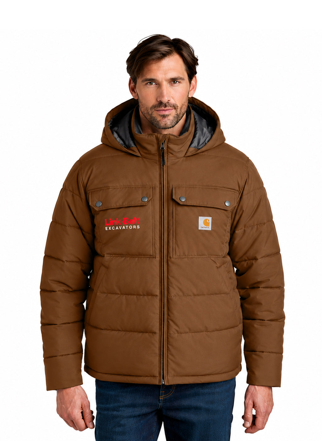 A man wearing a brown hooded puffer jacket with 'LARKS EXCAVATIONS' text on the left chest and a Carhartt logo patch on the right chest, paired with blue jeans against a white background.