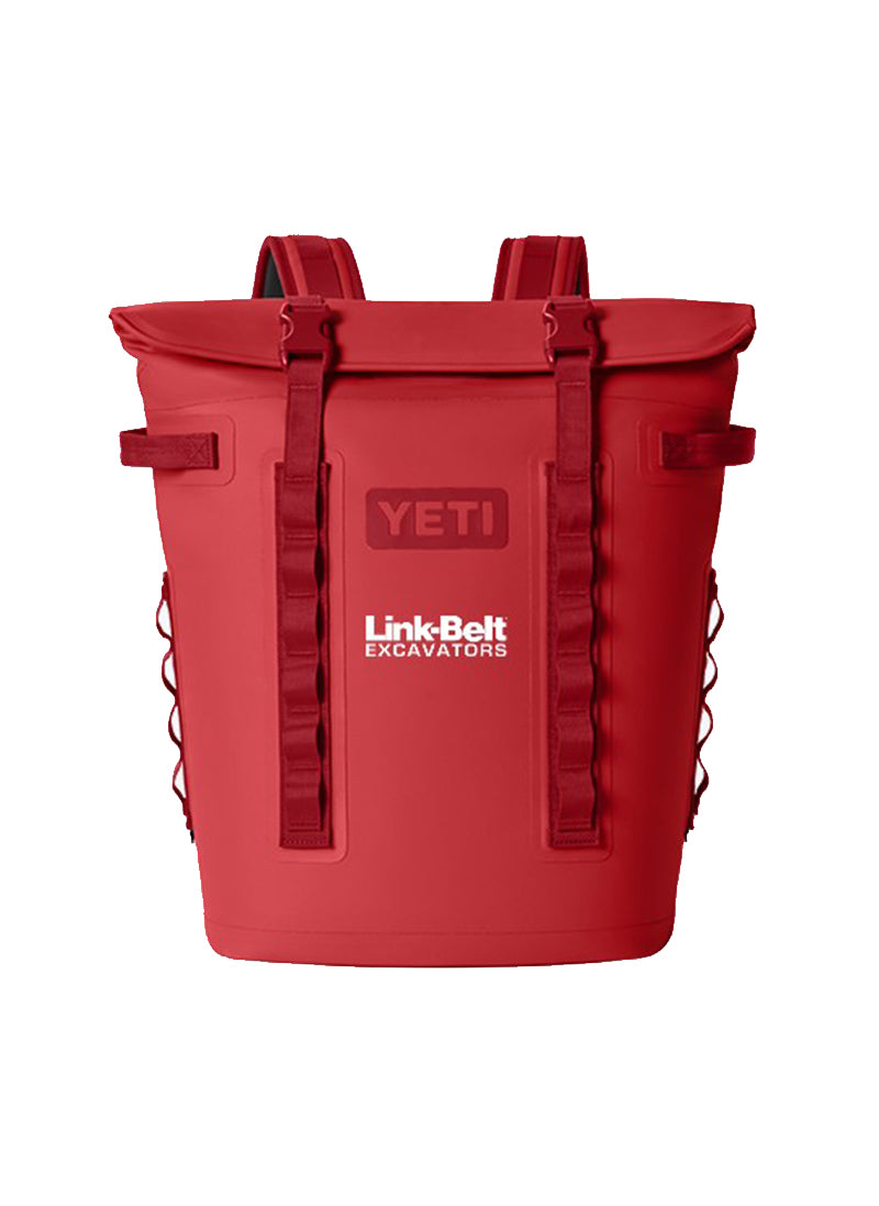 A red YETI Link Belt Excavators backpack attachment bag with white branding on the front, shown against a plain white background.