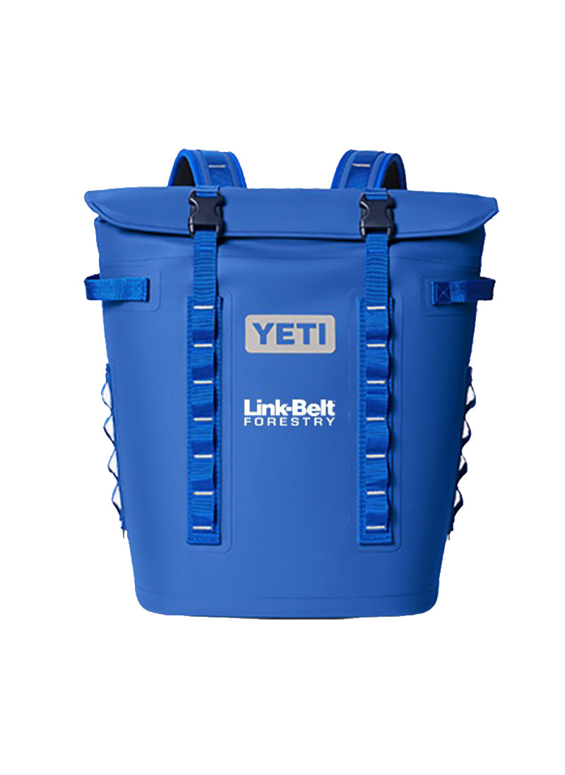 A blue YETI Link Belt Forestry backpack-style cooler bag with front buckles and side lacing, shown on a plain white background.